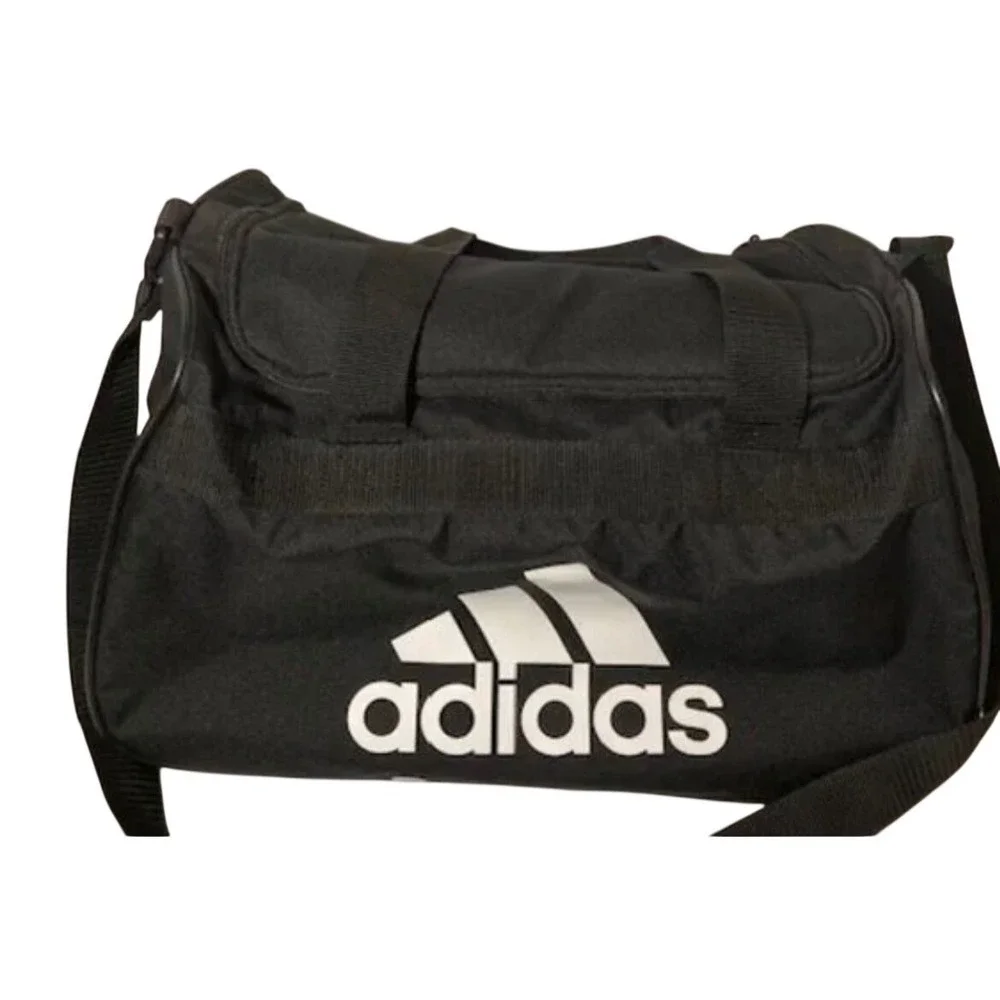 adidas travel bag for men Unisex Team Issue Sports Duffel and Women bag and webbing loops for even more storage options Adidas Defender IV Duffel Bag